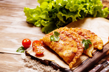 Cheburek, fried pie with meat and onion, traditional turkish and mongolian dish