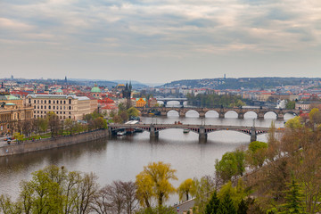 Ancient bridges of Prague over Vltava river. Heart of old town. Czech Republic. Spring time.
