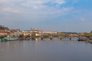 View of Vltava river in Prague and Charles bridge and the Castle, Czech Republic