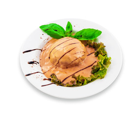 Cutlet filled with red sauce, decorated with green leaves on a white plate. Clipping path.