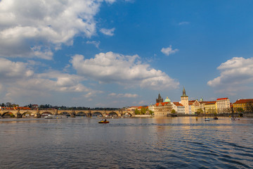 Fototapeta na wymiar View on the river Vltava with boats. Old town of Prague, Czech Republic, summer season.
