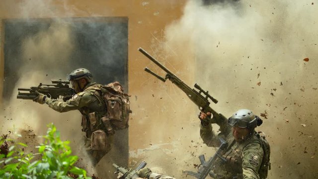 Soldiers after explosion, slow motion