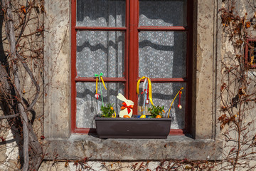 Vintage window with Easter decoration in old Europenian castle