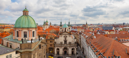 Fototapeta na wymiar Panoramic view of old city with The Church of St. Francis, Klementinum, Prague, Czech Republic
