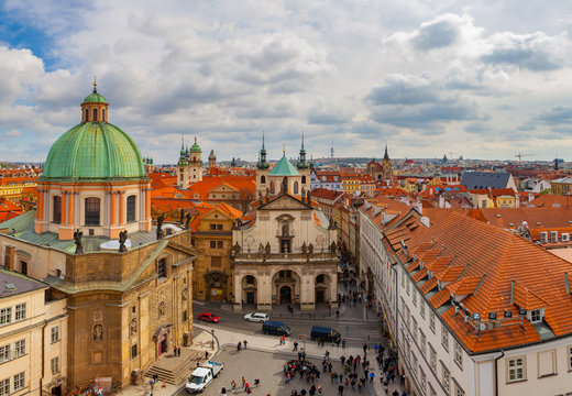 PRAGUE, CZECH REPUBLIC - APRIL 25, 2017: Panoramic view of old city with The Church of St. Francis, Klementinum