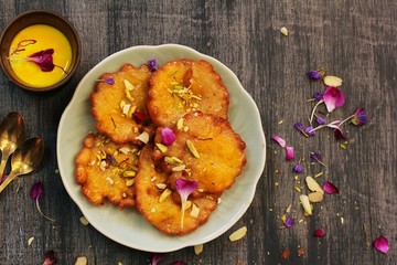 Malpua - Traditional Indian sweet pancake coated in sugar syrup