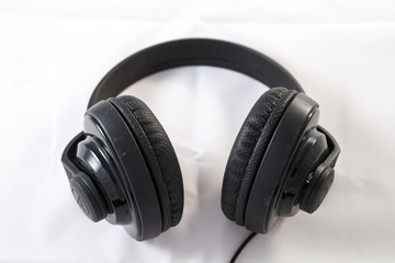 Fototapeta na wymiar Black classic headphones on white background