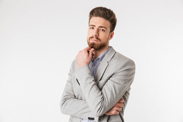 Fototapeta premium Portrait of a pensive young man dressed in shirt