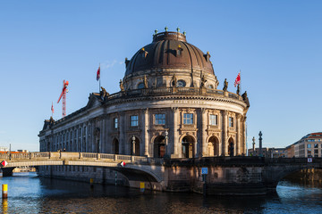 Fototapeta premium BERLIN, GERMANY - FEBRUARY 21, 2017: Beautiful view of historic museum island with Bode building and with a bridge
