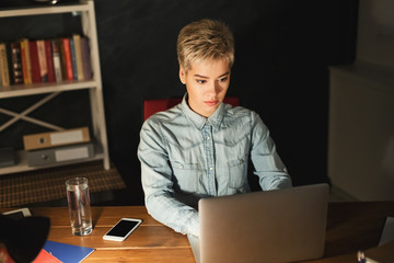 Thoughtful woman at office copy space