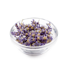 Fototapeta na wymiar Dried lavender flowers in glass dish isolated on white background.