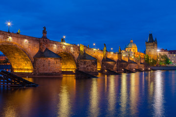 Fototapeta na wymiar Night and illuminated Charles Bridge, Prague, Czech Republic