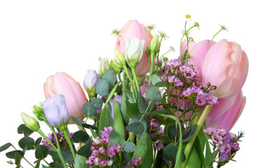 bouquets of tulips, other spring flowers and greenery on white b