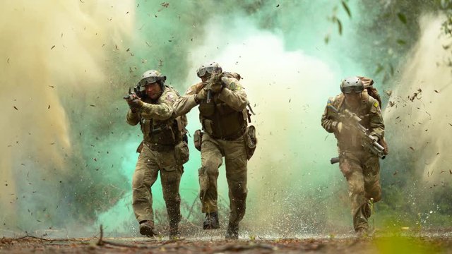 Military men in action, slow motion