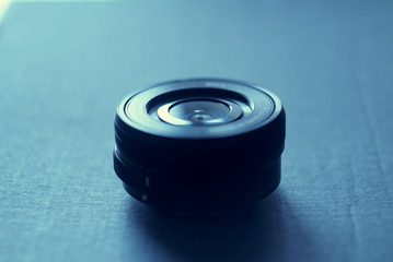 black lens on a blue background, focus