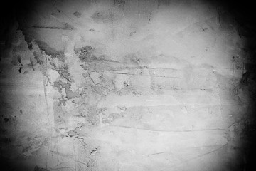 Wall fragment with scratches and cracks