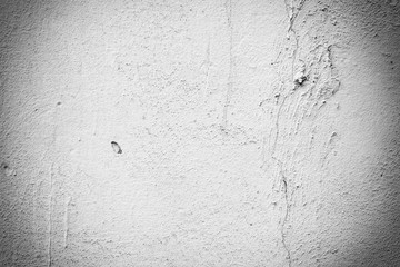 Wall fragment with scratches and cracks