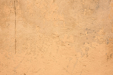 Wall fragment with scratches and cracks