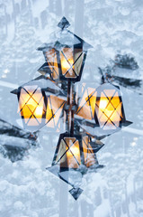 abstract Double exposure of chrismas winter lantern in snow 