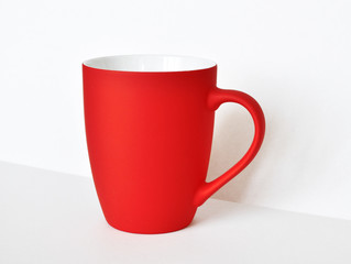 Red mug on on white
