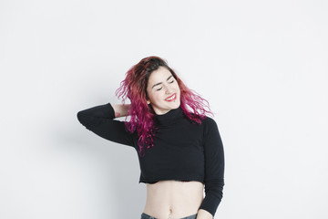 Fototapeta premium young woman with freedom and trendy pink hair