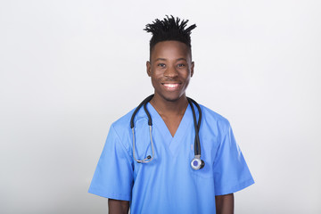 African-American doctor on a gray background