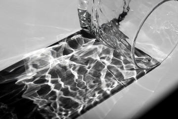 Beautiful caustic effect as light passes through a glass