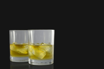 two glasses whiskey