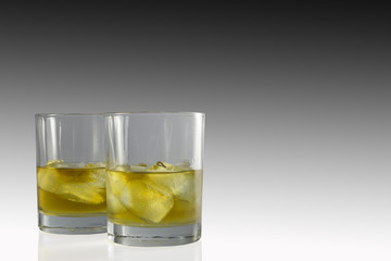 two glasses whiskey