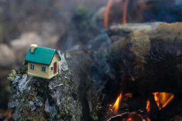 Toy house by the fire