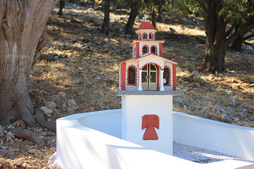 Greek kandilakia, miniature churches on the roads. A small village iconostasis, reminiscent of a church small copy for lighting candles. Greece
