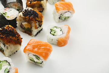Set of sushi rolls, maki on white background