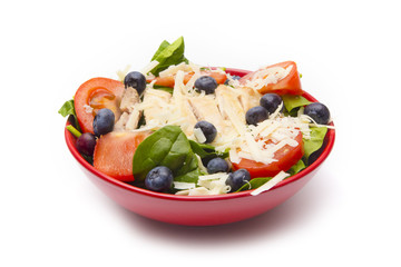 Fresh Salad with Chicken, Tomatoes Blueberries and Parmesean Cheese