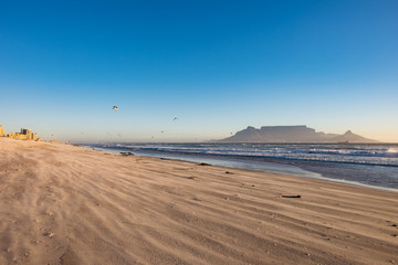 Fototapeta na wymiar Kite Surfers In Table Bay