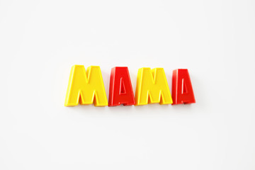 The word from magnets is MAMA, Magnetic board