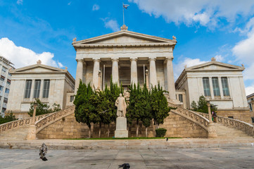 Fototapeta na wymiar National library in the center of Athens Greece. One of the Trilogy of neoclassical buildings including the Academy of Athens and the original building of the Athens University in Panepistimiou street