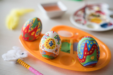 Fototapeta na wymiar Colored Easter eggs in the basket.Easter Eggs hand painted.