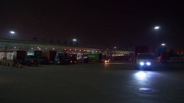 night time shenzhen city traffic port container terminal entrance panorama 4k china
