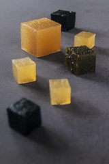 Delicious marmalade, as art. Vertical. Close up. Selective focus.