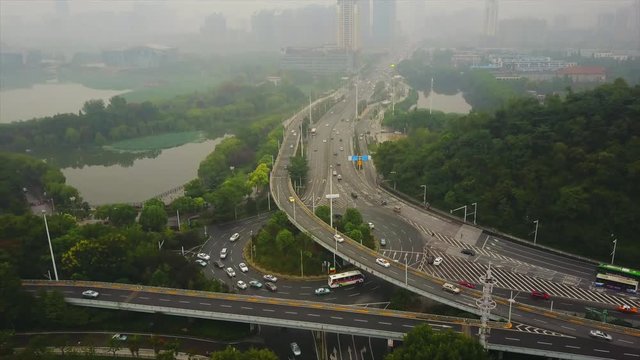day time wuhan cityscape traffic road junction aerial lake panorama 4k china
