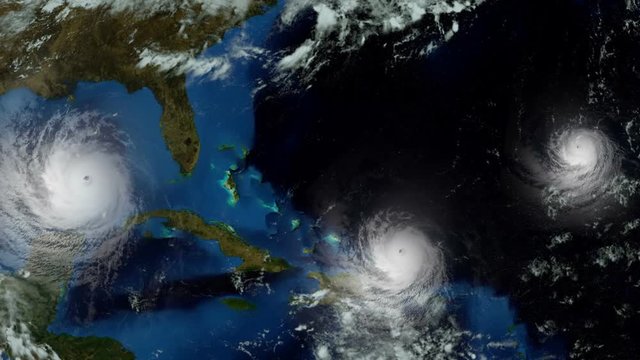 Three Major Hurricanes approaching the USA. Shot from Space. Elements of this animation are furnished by Nasa. 