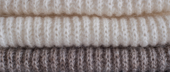 Minimalistic background with knitwear. Natural colors, natural Icelandic wool, a very simple pattern.