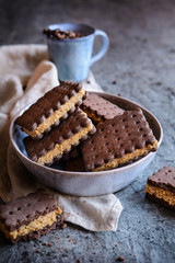 Cocoa sandwich biscuits stuffed with walnut and coffee filling