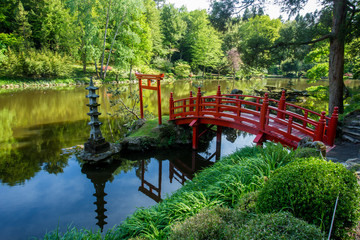 Red  bridge. Beauty nature in Japanese park in France in Maulivrier . Pays de la loire .