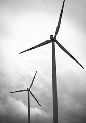 Windmills against a cloudy sky