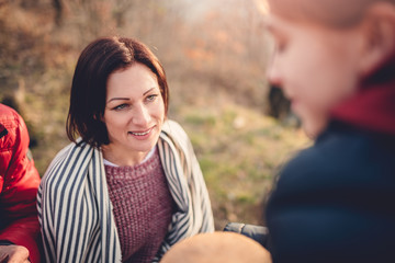 Mother talking with daughter outdoors