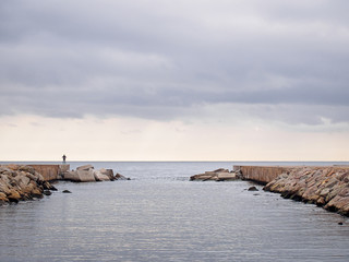 Fototapeta na wymiar Mediterranian sea from the Barcelona beach in cloudy weather