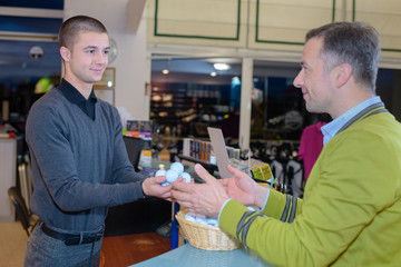 man buying fresh eggs