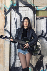 Young woman with classic guitar
