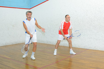 Men playing squash